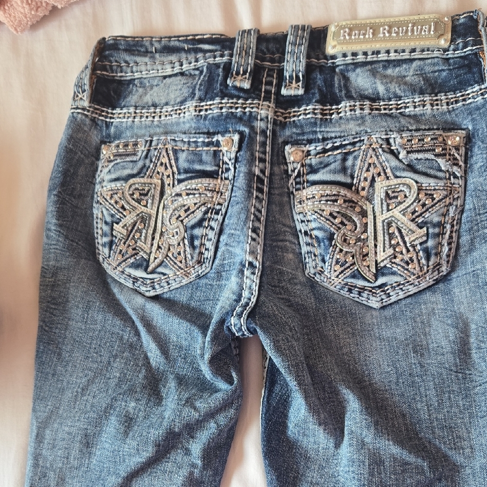 Rock Revival Blue Jeans with Ornate Back Design